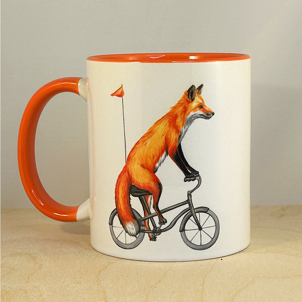 Fox Riding a Bike Mug